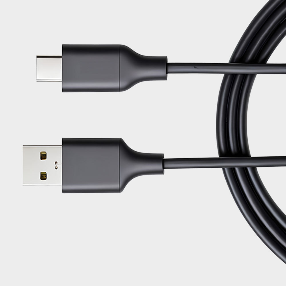 A black USB cable with a USB-A connector on one end and a USB-C connector on the other, coiled neatly against a plain light gray background.