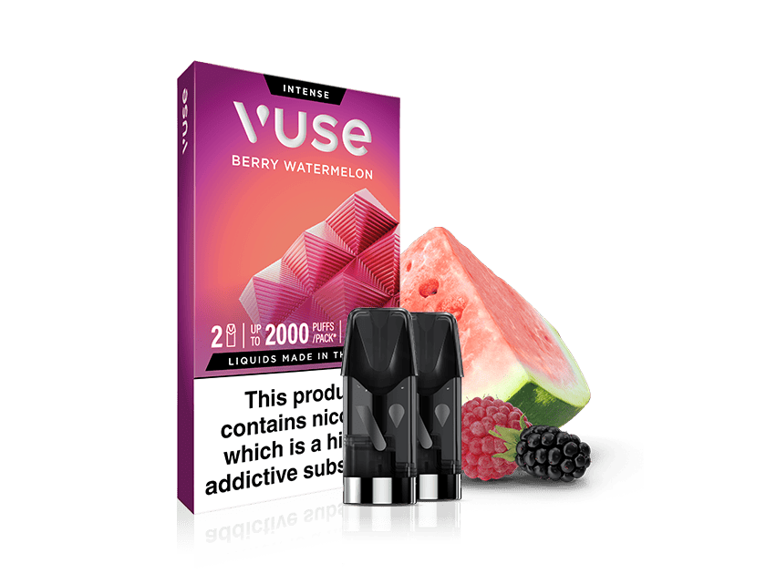 Box of Vuse Berry Watermelon vape pods with two pods in front. The box features a pink-purple design, and fresh watermelon, raspberry, and blackberry are shown beside the products.