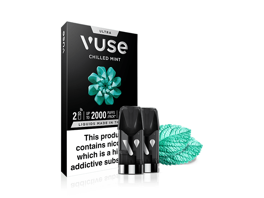 A Vuse Chilled Mint vape cartridge pack with two black cartridges in front, featuring an image of mint leaves and a nicotine addiction warning label on the packaging.
