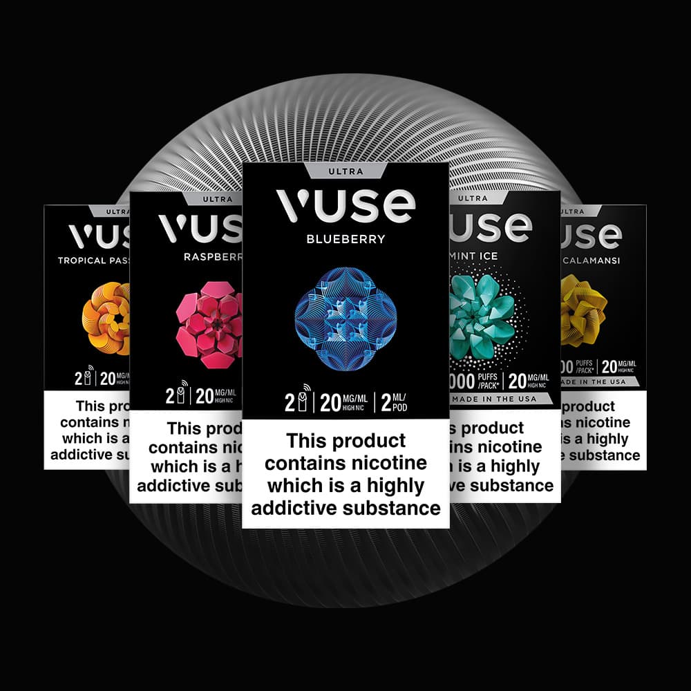 Four Vuse vape pod packs—Tropical Passion, Raspberry, Blueberry, and Mint Ice—are displayed side by side on a black background, each showing a warning about nicotines addictive nature.