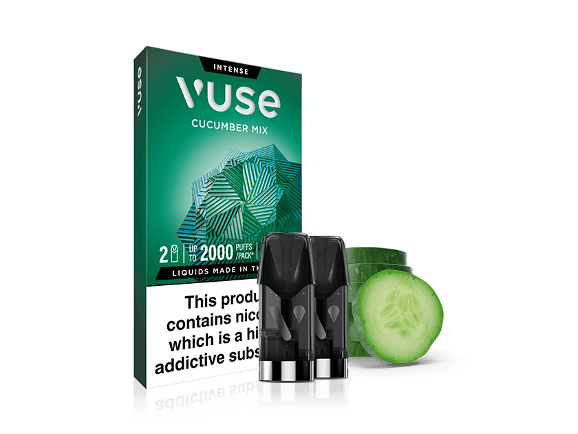 A Vuse Cucumber Mix vape pod pack with two black vape pods in front, next to a sliced cucumber and cucumber half. The packaging warns about nicotine being a highly addictive substance.