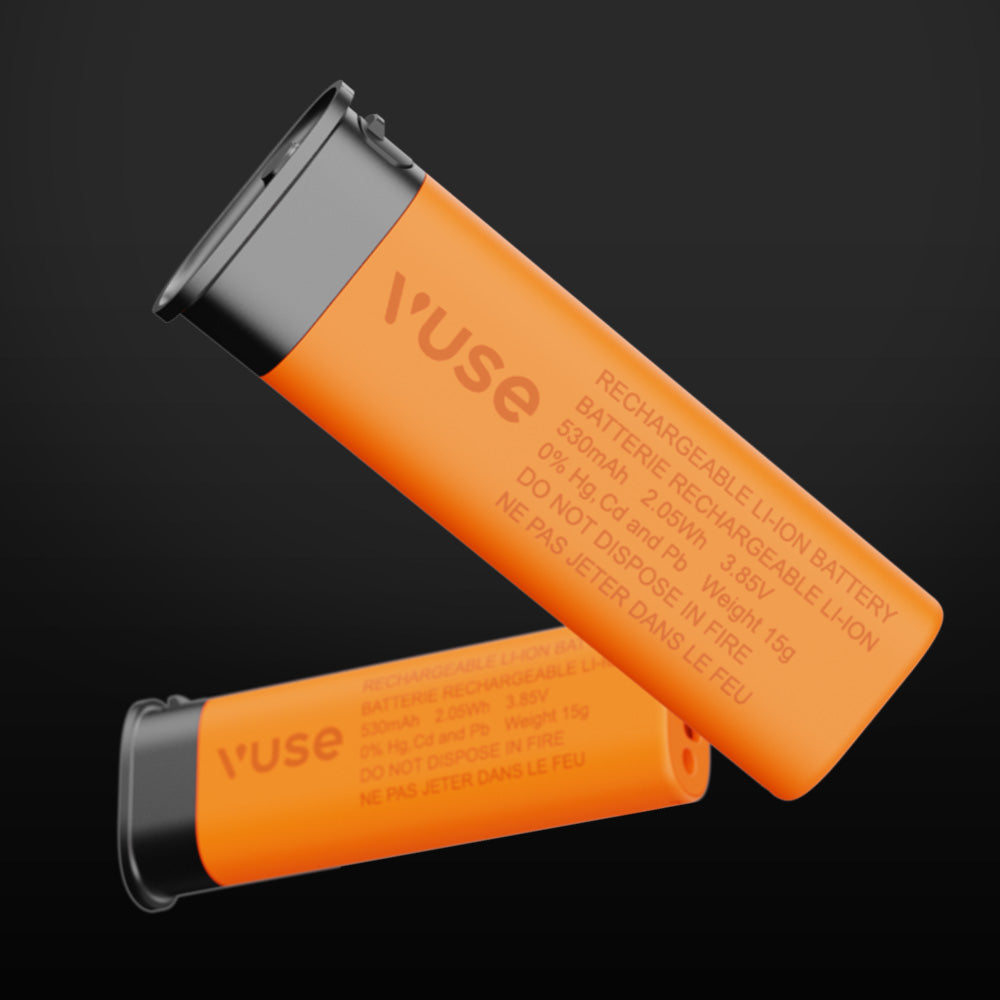 Two orange Vuse rechargeable lithium-ion batteries with silver tops are shown, one standing upright and one lying down, against a black background. Text with battery specifications is visible on both batteries.