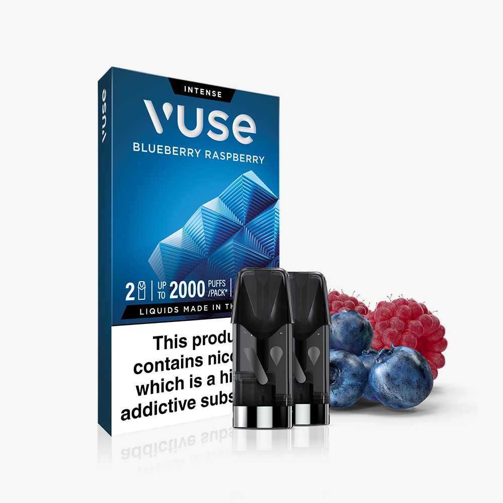 A pack of Vuse Blueberry Raspberry Extra Intense Flavour Pods, featuring two pods in front with fresh blueberries and raspberries. Packaging highlights nicotine and addiction warnings; compatible with Vuse PRO devices.