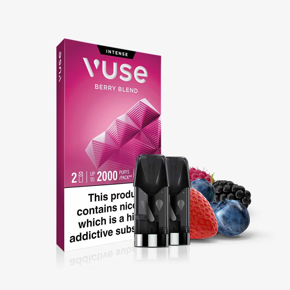 A pack of Berry Blend Vuse Extra Intense Flavour Pods by Vuse is displayed at the front, featuring two pre-filled e-liquid pods surrounded by strawberries, blueberries, and blackberries. The packaging includes a nicotine warning—emphasizing the bold, fruity experience of every Berry Blend pod from Vuse.