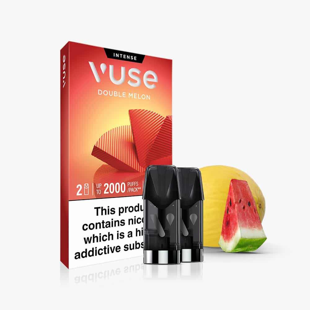 A box of Double Melon Vuse Extra Intense Flavour Pods sits in front of two pods, accompanied by a whole melon and a watermelon slice on a white background. Compatible with Vuse PRO devices, these pods feature smooth nic salts for a satisfying vaping experience.