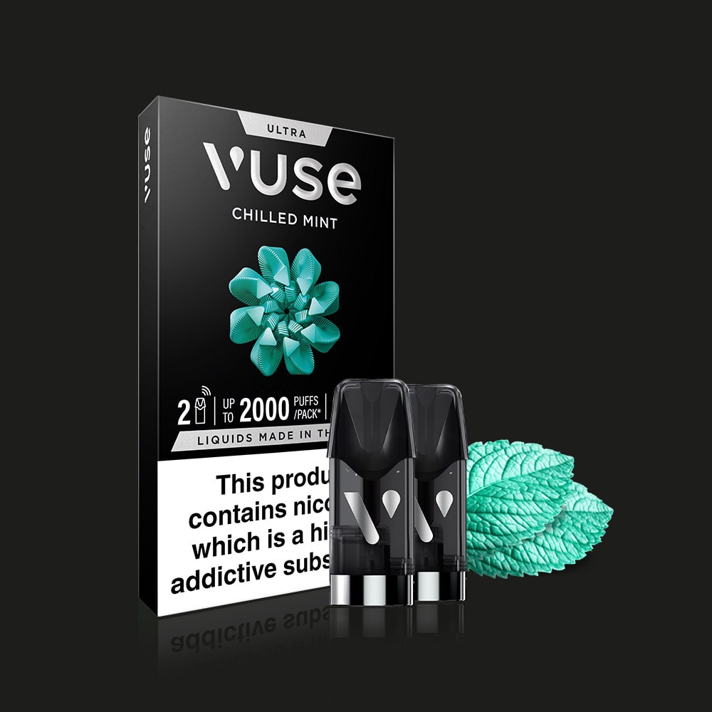 A box of Vuse Chilled Mint Ultra Smart Pod, two pods, and mint leaves are shown on a black background. The packaging highlights refreshing mint flavour, nic salts, 2 pods per pack, up to 2000 puffs, and a nicotine warning.