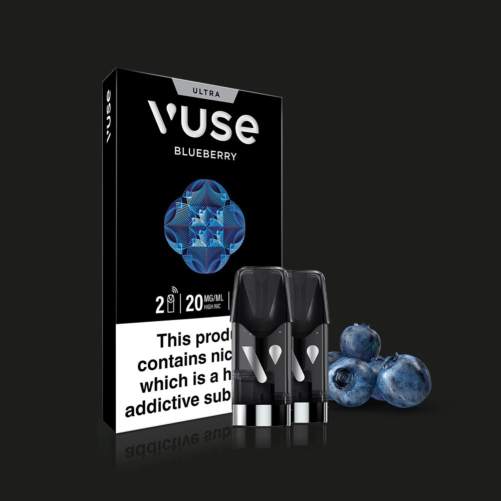 Vuse Blueberry Ultra Smart Pod packaging with two pods in front and fresh blueberries beside them on a black background. The box indicates 20mg/ml nicotine strength and displays a nicotine addiction warning.