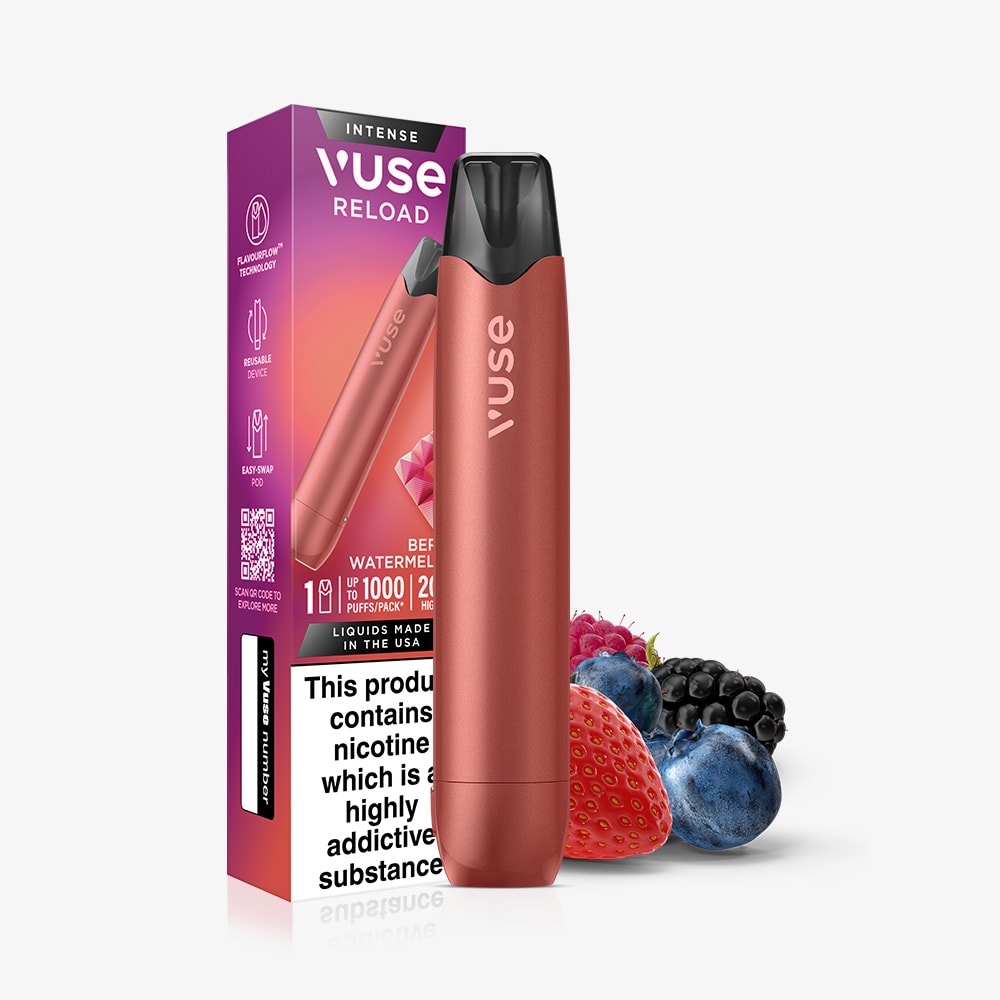 A Berry Watermelon Vuse Reload Pen stands upright next to its packaging, with fresh berries in front. The box displays a warning label. This reusable vape by Vuse uses a prefilled pod system.