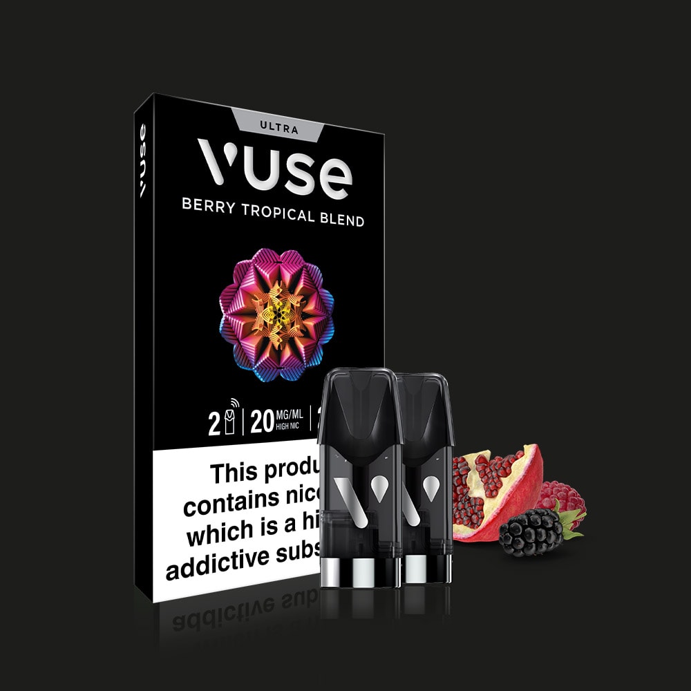 Vuse Berry Tropical Blend Ultra Smart Pod packaging is shown with two cartridges, pomegranate slices, and blackberries on a black background, highlighting a smooth vape experience thanks to its advanced ceramic heater technology.