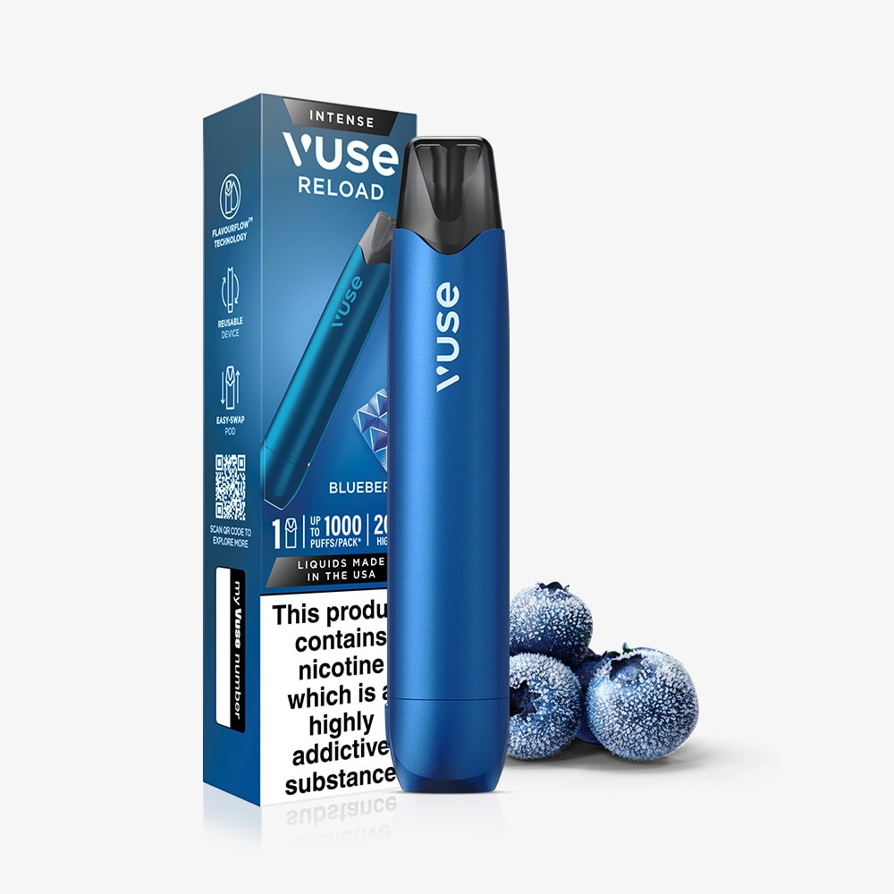 The Blueberry Ice Vuse Reload Pen is shown next to its packaging, which features nicotine warnings and product details. Three frosted blueberries are placed alongside the pen to highlight the flavor.