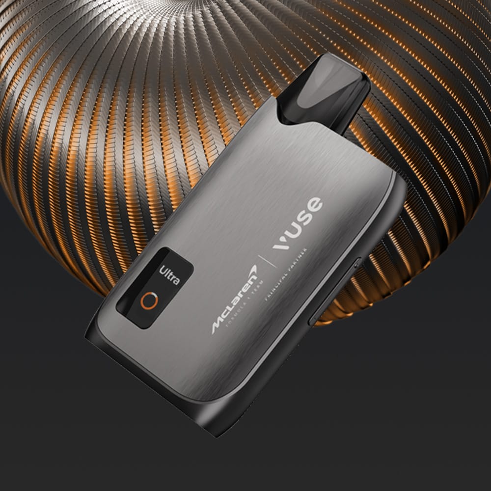 A sleek Vuse Ultra Device McLaren by Vuse, featuring limited edition branding, is displayed at an angle against a background of swirling metallic coils.