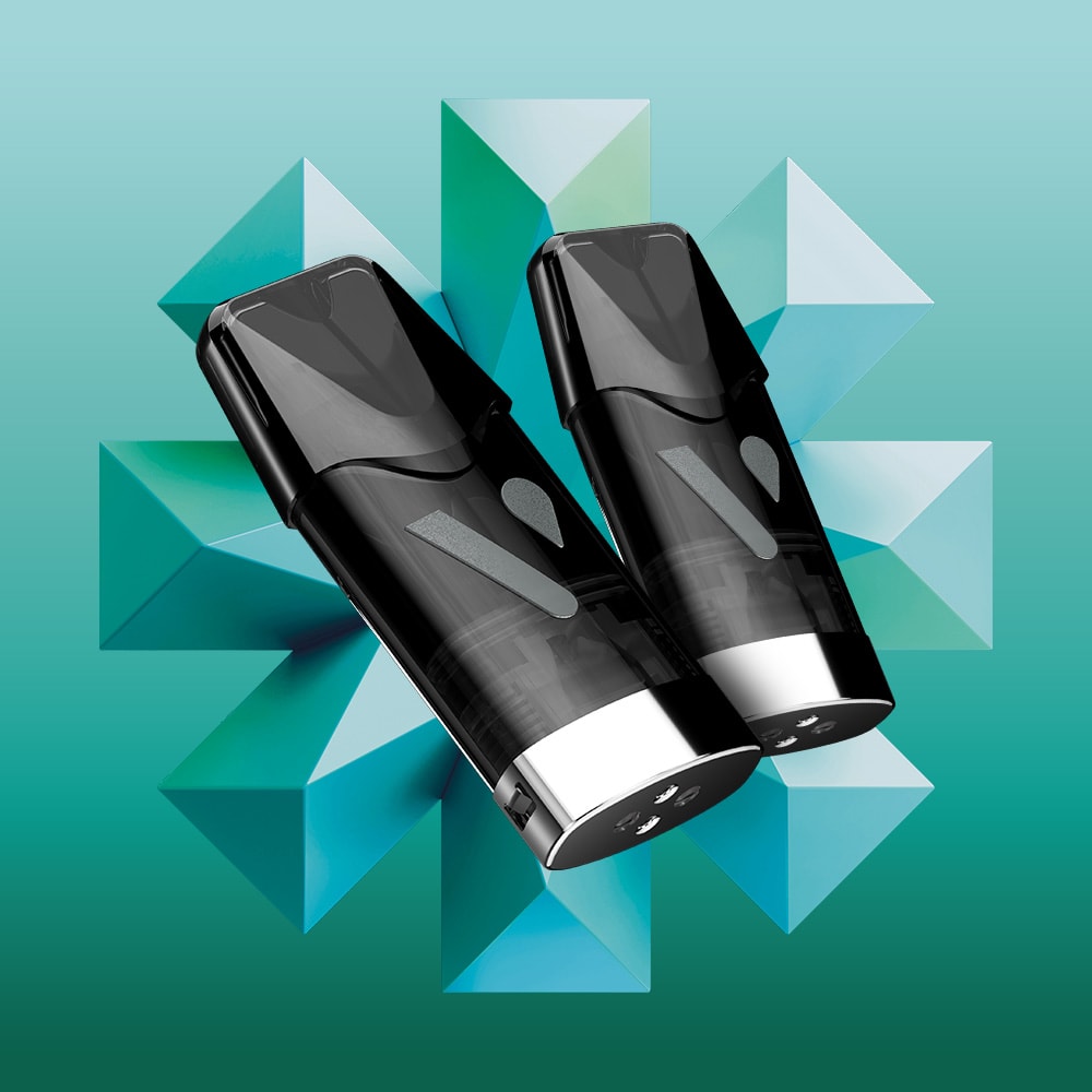 Two sleek, black and silver Chilled Mint Vuse Classic Flavour Pods from Vuse stand upright against a teal geometric background with crystal-like shapes, emphasizing their refreshing mint appeal.