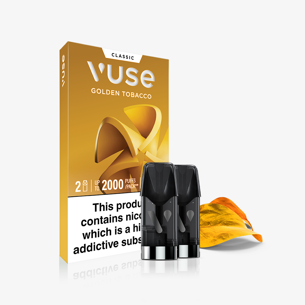 A Vuse Golden Tobacco Classic Flavour Pod stands upright beside two vape pods and a golden-brown tobacco leaf, emphasizing its smooth nic salt taste, with the nicotine warning label displayed on Vuse packaging.