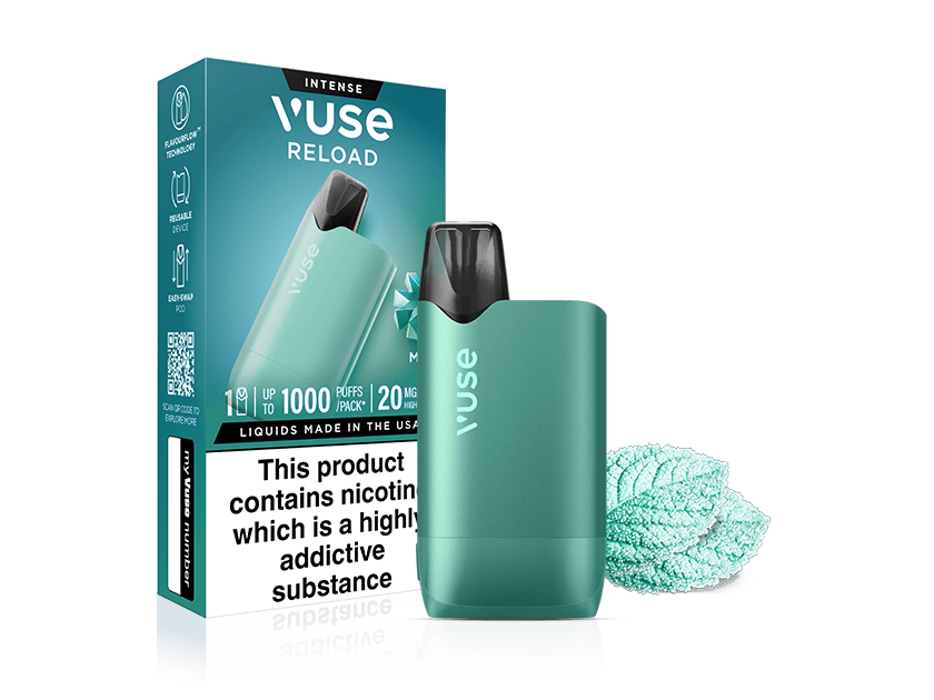 A teal Vuse Reload vape device is shown standing next to its packaging box. The box displays product information and a nicotine warning label. Mint leaves are placed beside the device, suggesting a mint flavor.