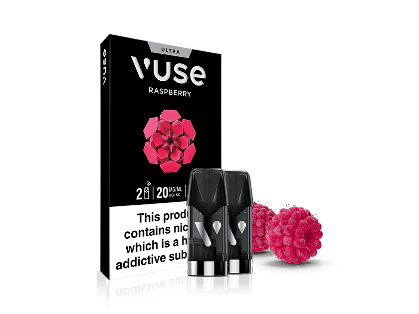 Vuse Raspberry vape pod packaging with two pods in front, an image of a raspberry on the box, and two real raspberries beside the pods; warning label states product contains nicotine.