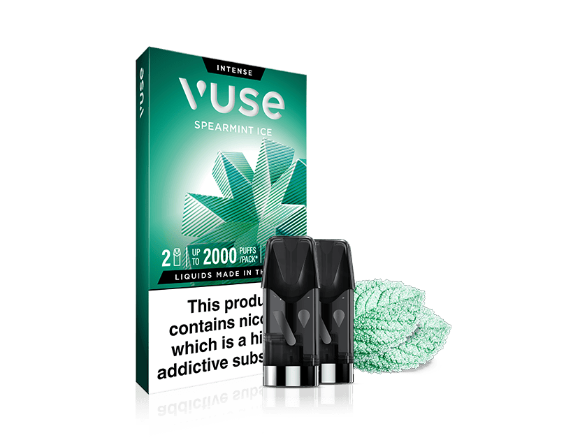 A Vuse Spearmint Ice vape pod package is shown with two pods and mint leaves beside it. The box is green with a mint leaf graphic and text highlighting up to 2000 puffs and a nicotine warning label.